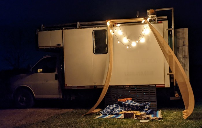 We stayed up late, watching a movie in the warm spring breeze.